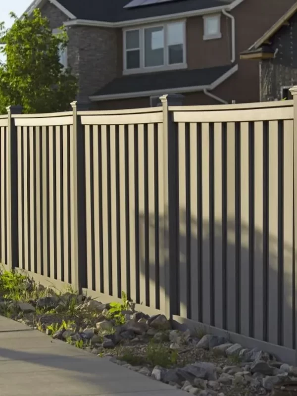 Vinyl fencing around a home.