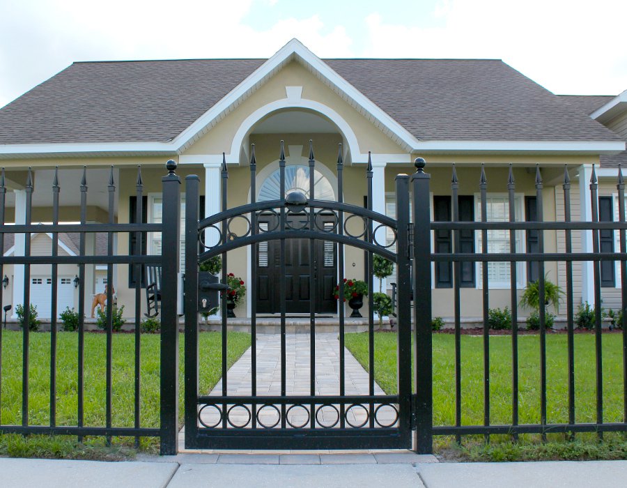 front yard with black aluminum gate