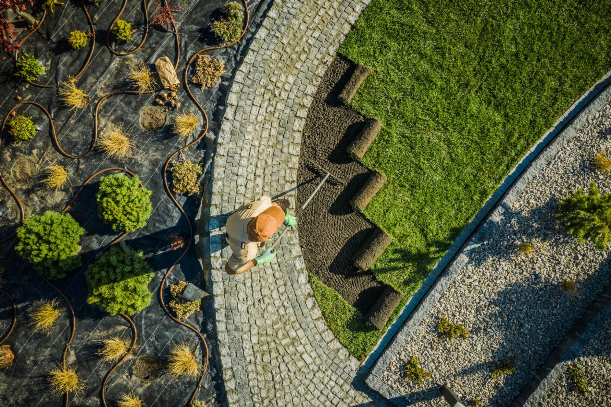 Man working outside on landscaping.