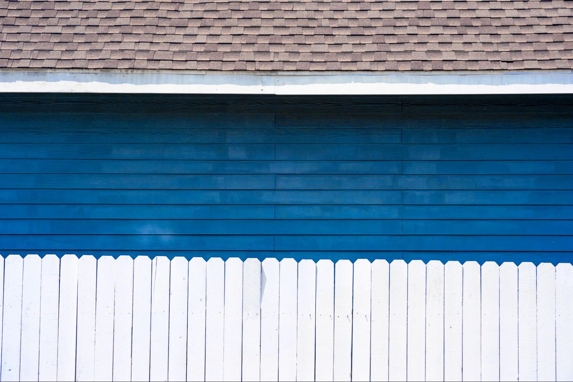 Home with a wooden fence.