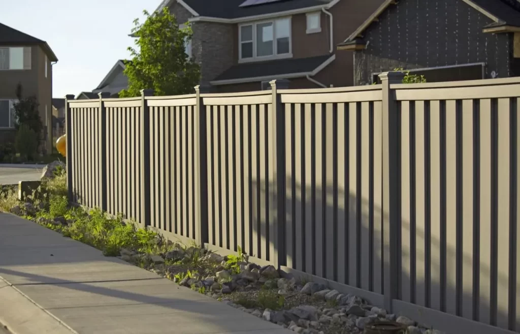 Vinyl fencing around a home.