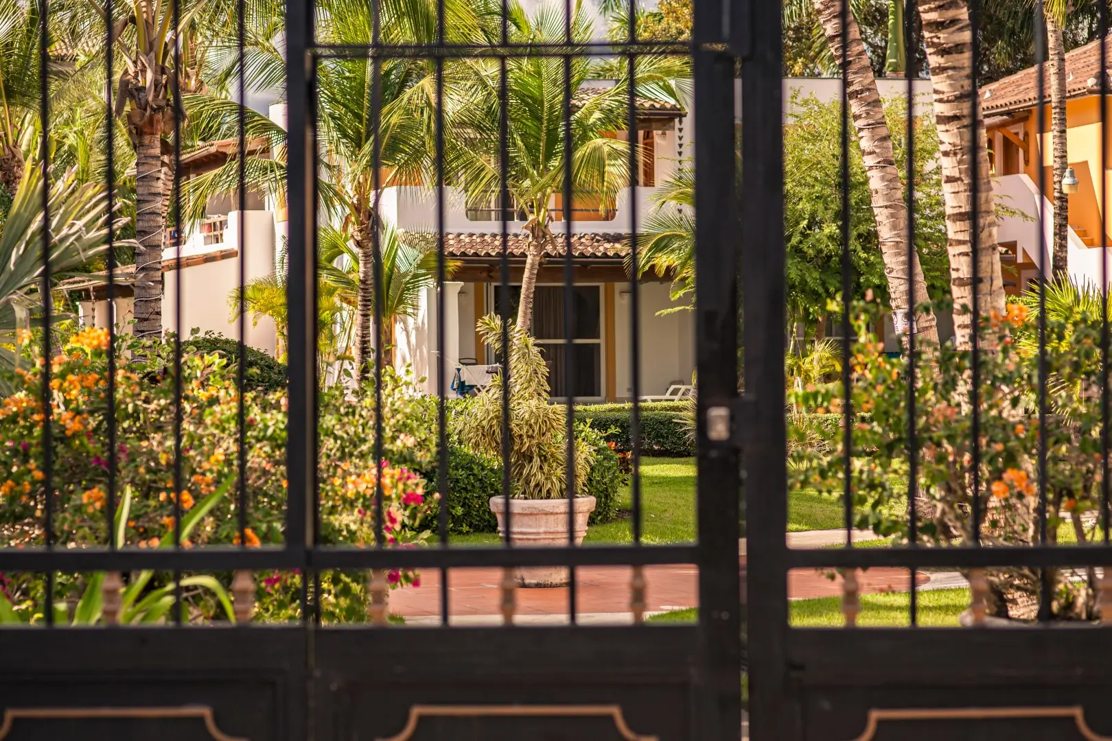 A gated entrance to a house.