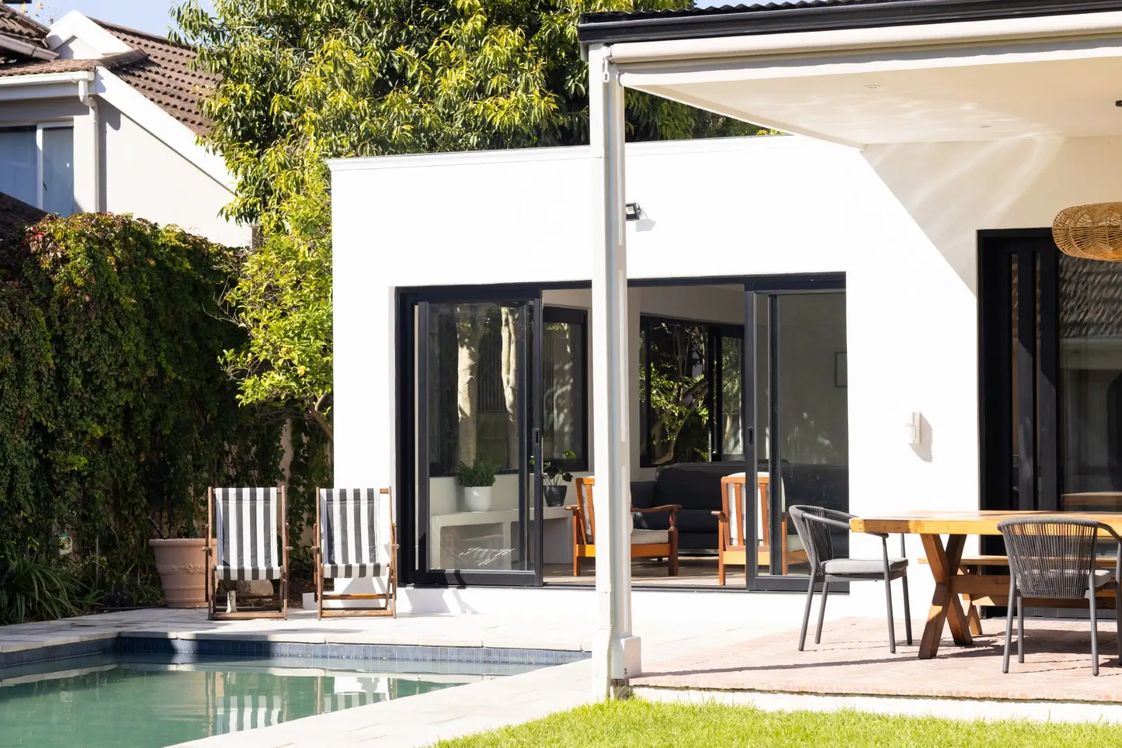 A modern house with a covered patio.