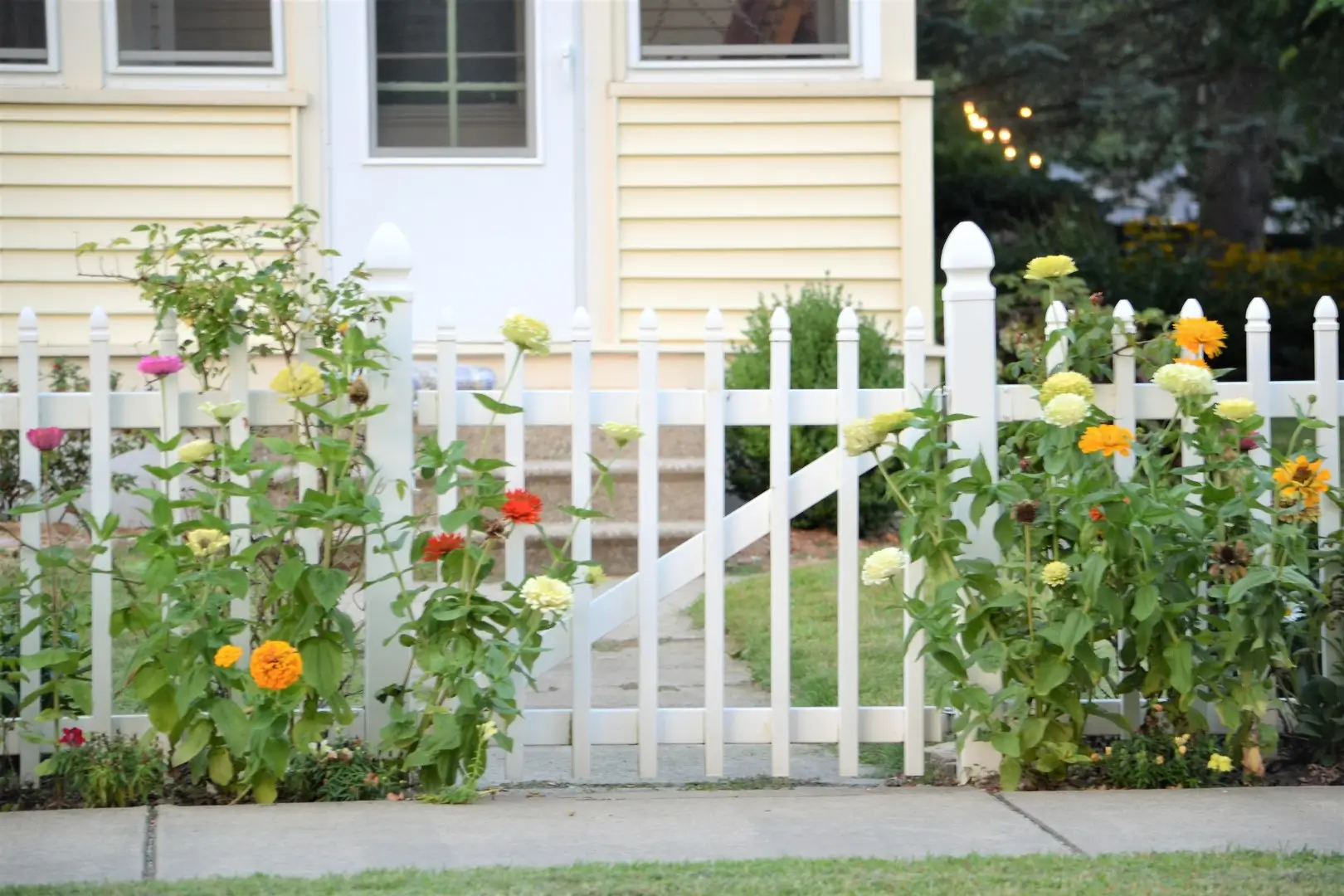 A white front yard fence.