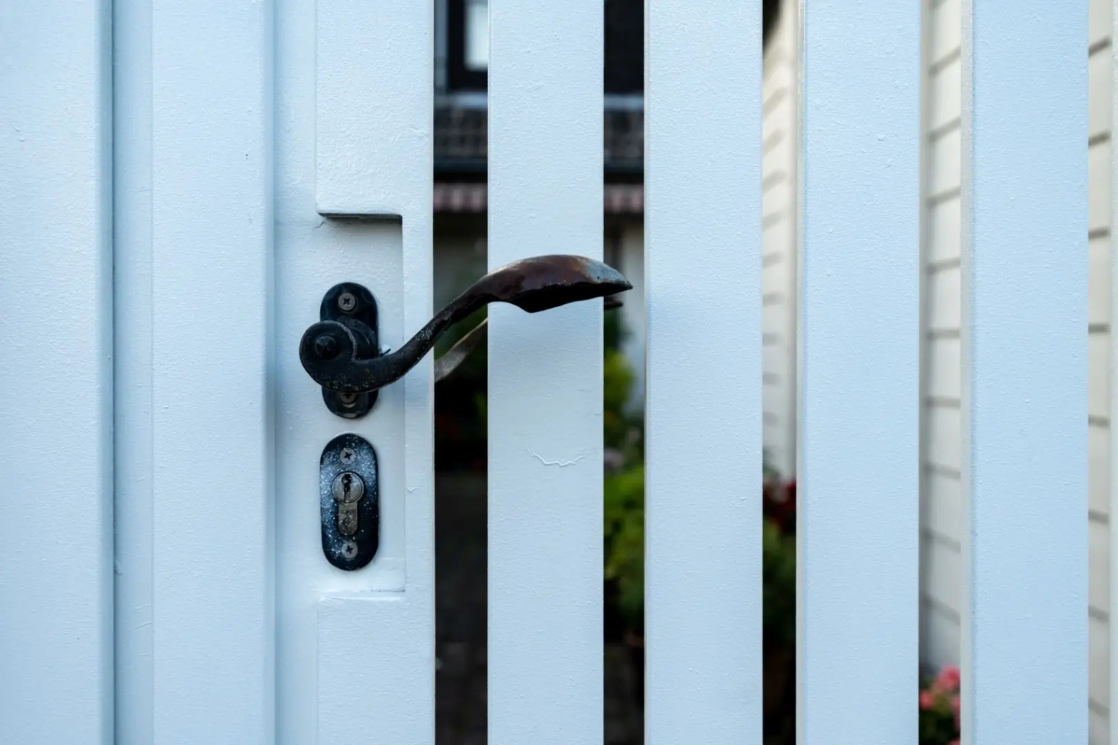 Handle on a gate of a vinyl fence.