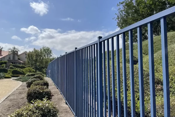 A blue metal railing fence.