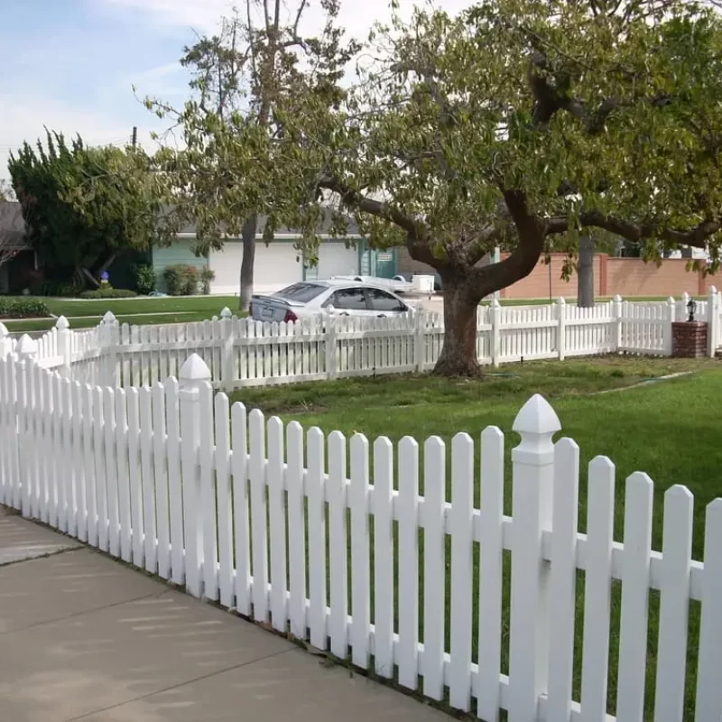 white fence in the front yard.