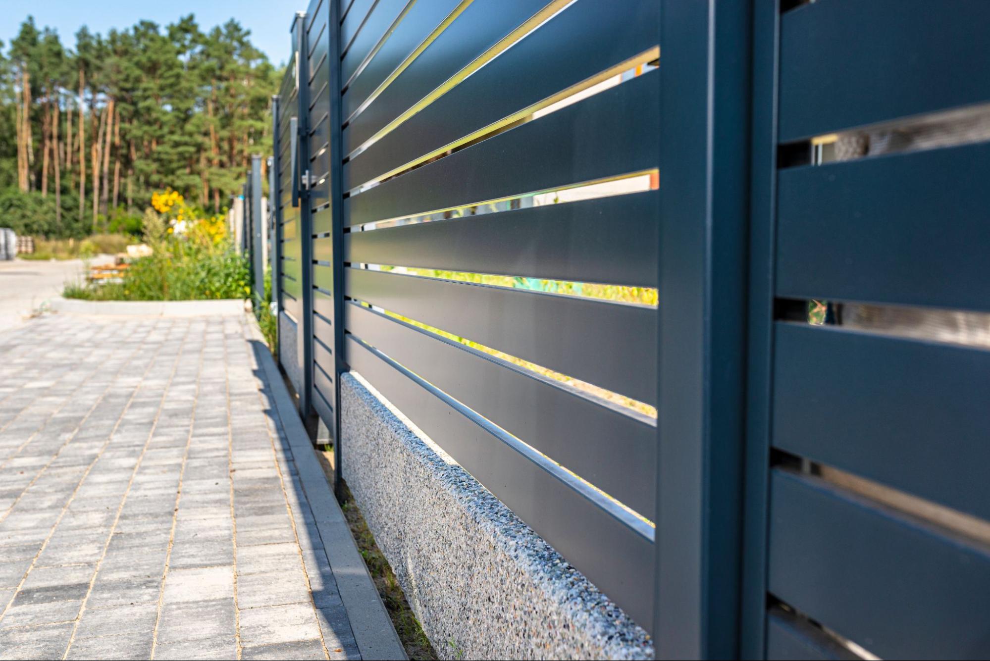 Steel fence in front of a home.