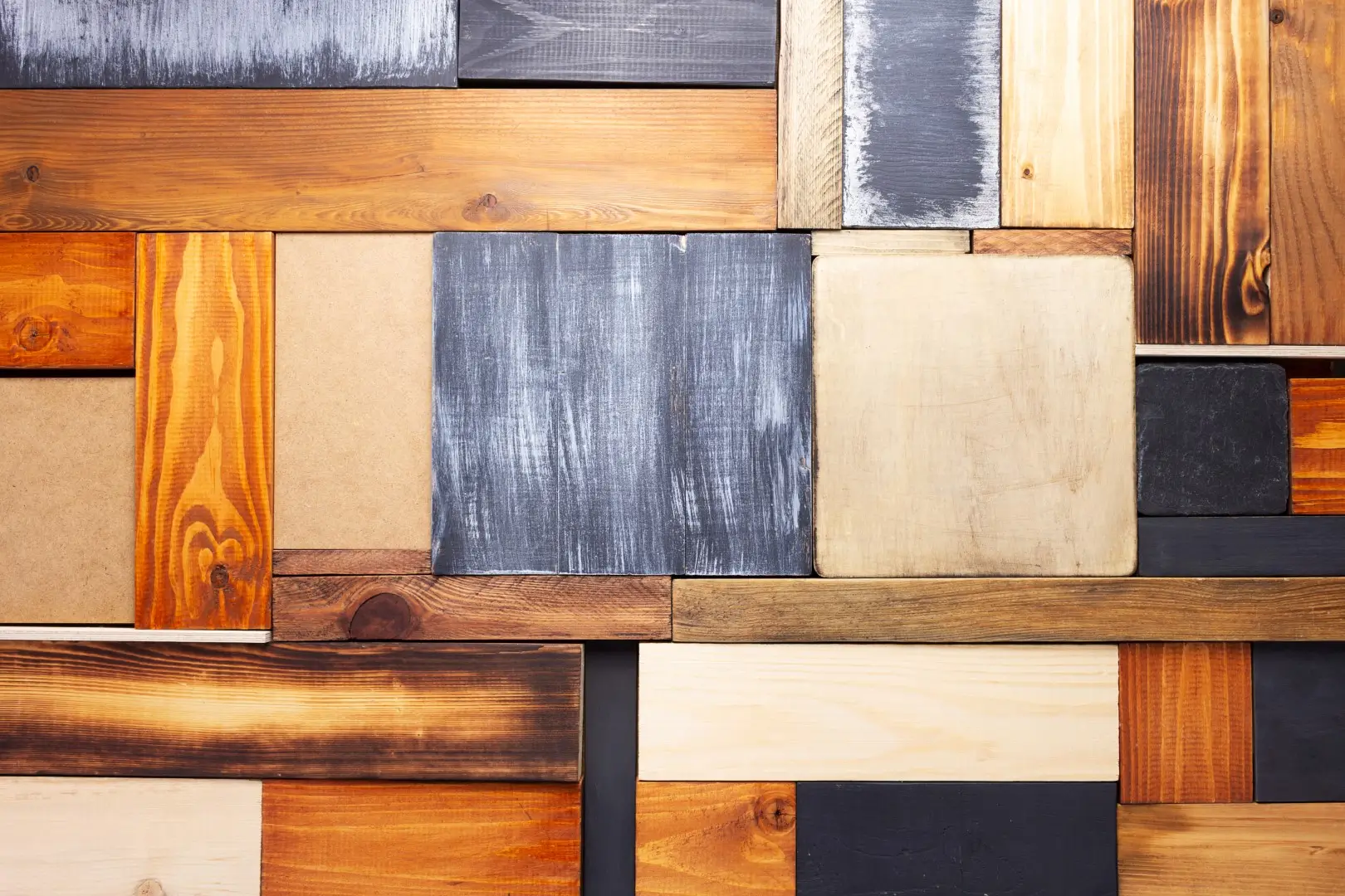Wood timber blocks showcasing different natural colors and grain patterns.
